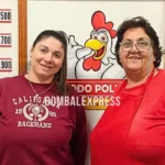 Marcia y Adriana, en el negocio Todo Pollo, detrás del mostrador.